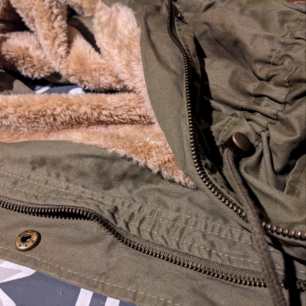 Sleeveless faux fur lined jacket